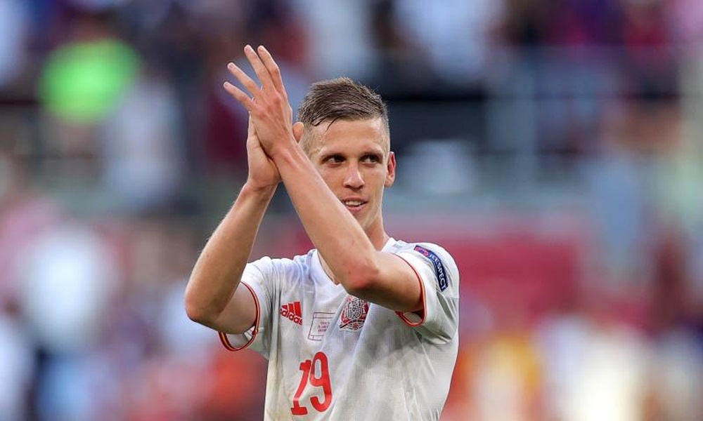 Dani Olmo e vários gigantes de peso na sua cola. EFE/EPA/Friedemann Vogel