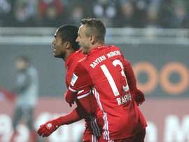Bayern Munich midfielder Douglas Costa celebrates after scoring with Rafinha. AFP