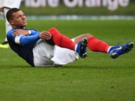 Mbappe went off in pain. AFP