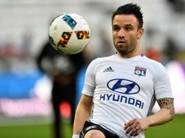 Mathieu Valbuena warms up whilst playing for Lyon