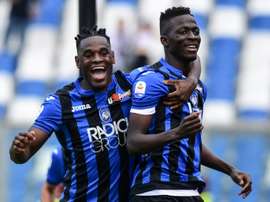Atalanta go third, Calhanoglu keeps AC Milan in UCL chase. AFP