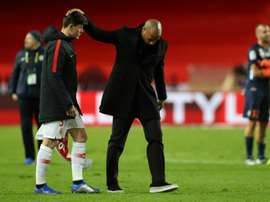 Henry consoled his players at the end of a defeat to Montpellier that he said was a disaster. AFP