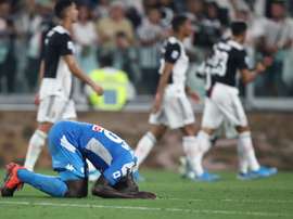 Koulibaly's own goal meant Napoli lost 4-3 after fighting back from 3-0 down v Juve. AFP