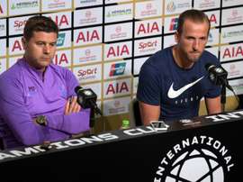 Pochettino (L) is not giving up after last season's loss in the CL final. AFP
