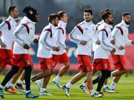 Benficas players run during a training session on April 12, 2016