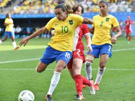 Marta in action during Brazil's bronze medal match against Canada. AFP