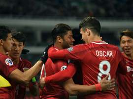 Hulk et Oscar sont rentrés en Chine dix minutes avant la fermeture des frontières. AFP