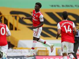 Bukayo Saka (C) scored for Arsenal in a 0-2 win at Wolves. AFP