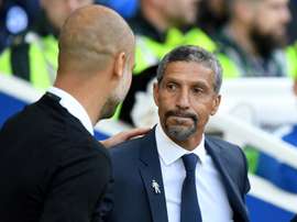 Hughton's side earned their first Premier League win thanks to a double from Gross. AFP
