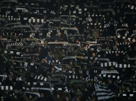 A linesman was injured when a fan threw a projectile at him. AFP