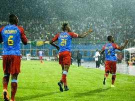 DR Congos Jonathan Bolingi (C) was part of a side that deservedly won the trophy and were rewarded for their exploits by the countrys president with brand-new 4x4s