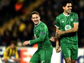 Celtics Kris Commons (L) and Tom Rogic celebrate after scoring a goal during an UEFA Europa League match in Istanbul, in December 2015