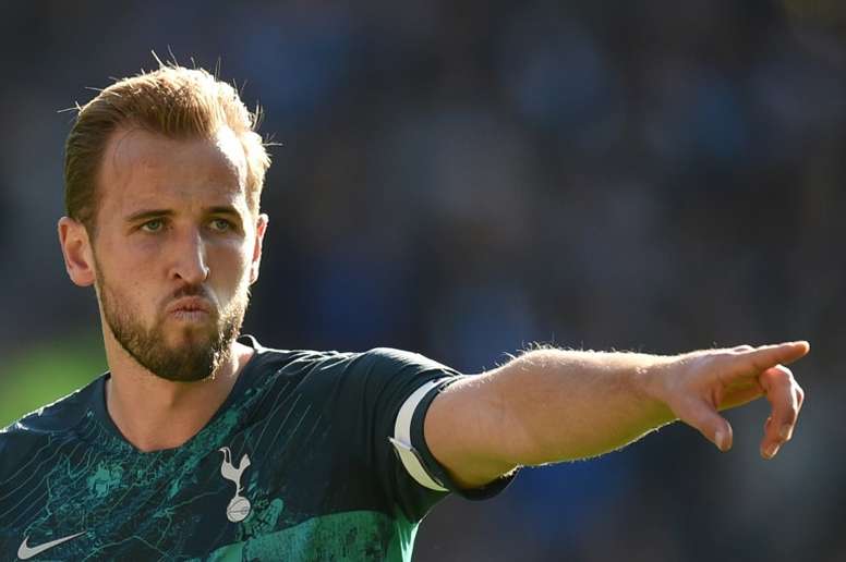 Harry Kane wants to see himself competing with Lionel Messi's goalscoring feats. AFP