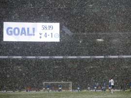 Tottenham won in snowy conditions. AFP