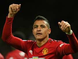 Alexis Sanchez celebrates Manchester United. AFP