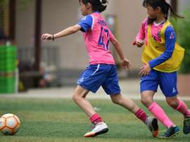 China women's football scraping the barrel. AFP