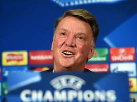 Manchester Uniteds Dutch manager Louis van Gaal smiles during a press conference at Old Trafford in Manchester, England on September 29, 2015 ahead of their UEFA Champions League football match against Wolfsburg on September 30