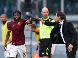 Gervinho célèbre un but avec son entraîneur à la Roma Rudi Garcia. AFP