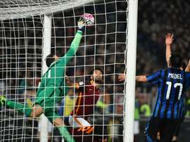 Inter Milan goalkeeper Samir Handanovic (L) pulls off a save during the Italian Serie A match against AS Roma