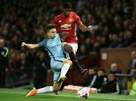 Maffeo (L) in action for Man City against Man Utd in the EFL Cup. AFP
