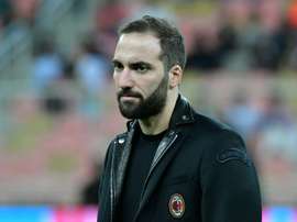 Higuain is reportedly edging closer to the Premier League. AFP