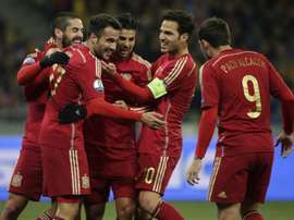Spains players celebrate after scoring during the Euro 2016 qualifying football match against Ukraine at Olympiysky stadium in Kiev on October 12, 2015