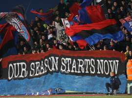 Crystal Palace fans hold a banner during aPremier League football match at Selhurst Park. BeSoccer