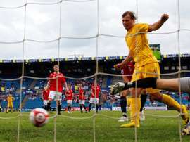 Roman Zozulya scoring with the national team of Ukraine. AFP