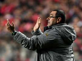 Napolis coach Maurizio Sarri gestures from the sideline during the UEFA Champions League Group B football match SL Benfica vs SSC Napoli at the Luz stadium in Lisbon, on December 6, 2016