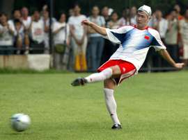 Legendary footballer in China's cross-hairs after 'overthrow' videos. AFP