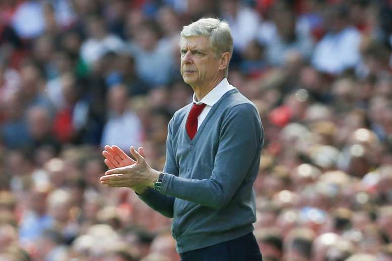 Arsene Wenger was cagey over a possible return to football management. AFP