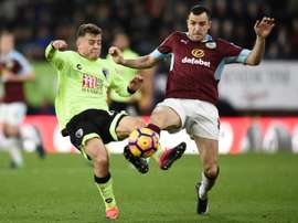 Burnley's Dean Marney (right) in action during a match against Bournemouth. AFP