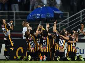 Bolivian team The Strongest celebrate a goal scored by Matias Alonso during their 2016 Copa Libertadores match against Sao Paulo held at Pacaembu stadium on February 17, 2016