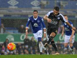 Leicester Citys midfielder Riyad Mahrez scores their second goal from the penalty spot during the English Premier League football match between Everton and Leicester City at Goodison Park in Liverpool, north west England on December 19, 2015