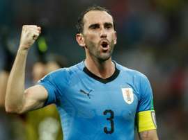 Godín dio caza a Pereira y entró en la historia de Uruguay. AFP