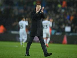 Potter walked away from Swansea and will become Brighton boss. AFP