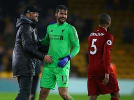 Alisson est de retour à l'entraînement deux mois plus tard. AFP