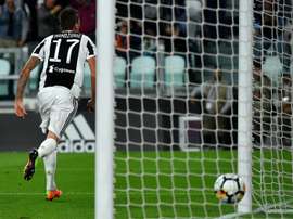 Mandzukic abriu a contagem nesta noite de domingo. AFP