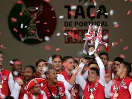 Sporting Bragas players hold the trophy after wining the Portuguese Cup final football match FC Porto vs SC Braga at the Jamor stadium in Oeiras, outskirts of Lisbon, on May 22, 2016