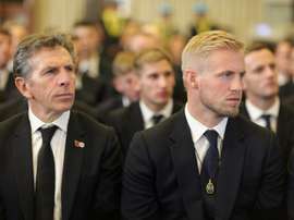 Schmeichel and Puel pictured at the funeral in Thailand. AFP