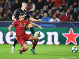 Liverpool travelled with Wijnaldum and without Lovren. AFP