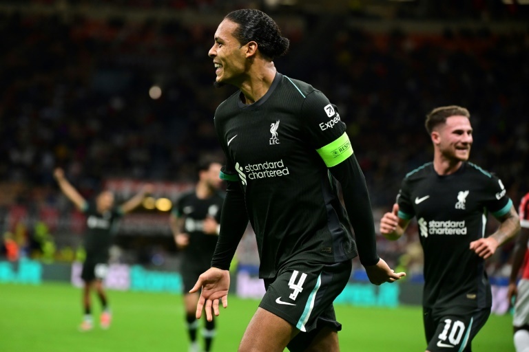 Stylish Liverpool strut past Milan in confident Champions league opener