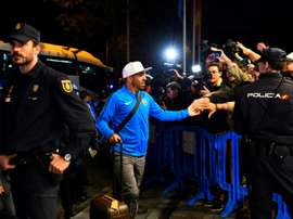Carlos Tevez arrived in Madrid with the rest of his Boca Juniors team-mates on Wednesday. AFP