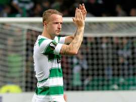 Celtics Scottish striker Leigh Griffiths applauds supporters on October 1, 2015