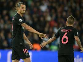 PSGs Zlatan Ibrahimovic (L) and Marco Verratti during the Champions League match against Malmo on September 15, 2015 at the Parc des Princes stadium