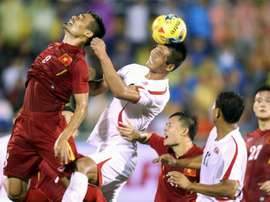 Nguyen Trong Hoang (left) plays for Vietnam against North Korea in Ho Chi Minh City last month
