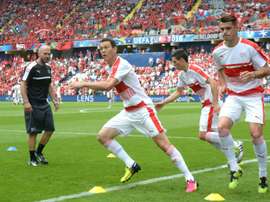 Switzerlands Stephan Lichtsteiner and Granit Xhaka (R) warm up ahead of their Euro 2016 Group A match against Albania, at the Bollaert-Delelis Stadium in Lens, on June 11, 2016