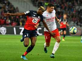 Nigeria forward Victor Osimhen claimed a late point for Lille . AFP