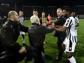 Savvidis marched onto the pitch with a handgun. AFP
