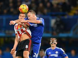 Sunderlands midfielder Jack Rodwell (L) jumps for a header with Chelseas defender John Terry during the English Premier League football match between Chelsea and Sunderland at Stamford Bridge in London on December 19, 2015
